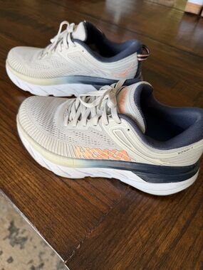 Hoka Bondi 7 Cream Running Shoes with Navy and Coral Accents